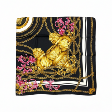 Versace silk scarf featuring ornate gold baroque motifs with pink accents available at Lestyle Boutique Melbourne