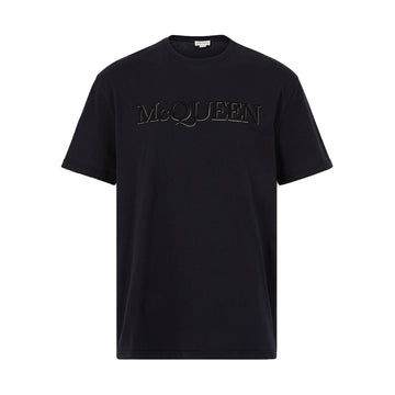 Alexander McQueen black t-shirt featuring an embroidered logo design, crafted from premium cotton for a luxurious feel. This designer piece showcases a classic crew neck and a regular fit, making it perfect for casual outings or elevating your everyday style. The high-quality craftsmanship ensures durability and comfort, making it a must-have for fashion enthusiasts. Available at Lestyle Boutique Melbourne.