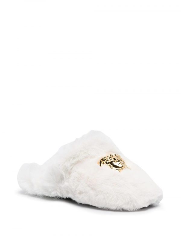 Versace Slippers featuring plush white fur with a gold Medusa emblem available at Lestyle Boutique Melbourne