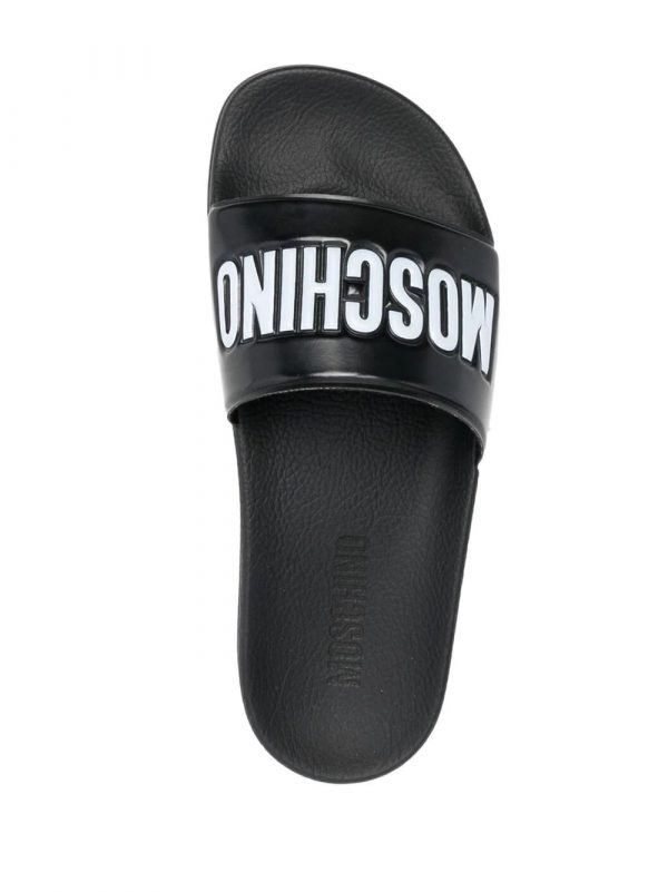 Moschino slides with rubber sole in black featuring white logo, available at Lestyle Boutique Melbourne