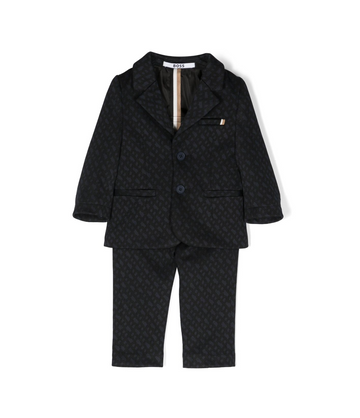 BOSS kidswear monogram single-breasted suit featuring a stylish embossed lining pattern. This premium black suit is designed for young boys, showcasing classic lapels and long sleeves for a sophisticated look. The front button fastening and three front pockets add functionality, while the straight-leg design ensures a modern fit. Perfect for formal occasions or special events, this luxury piece combines quality craftsmanship with a designer aesthetic, available at Lestyle Boutique Melbourne.