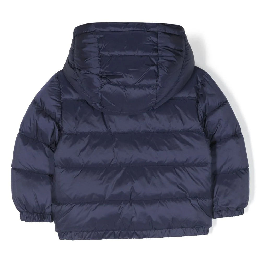 Navy blue puffer jacket with teddy bear logo on a white background