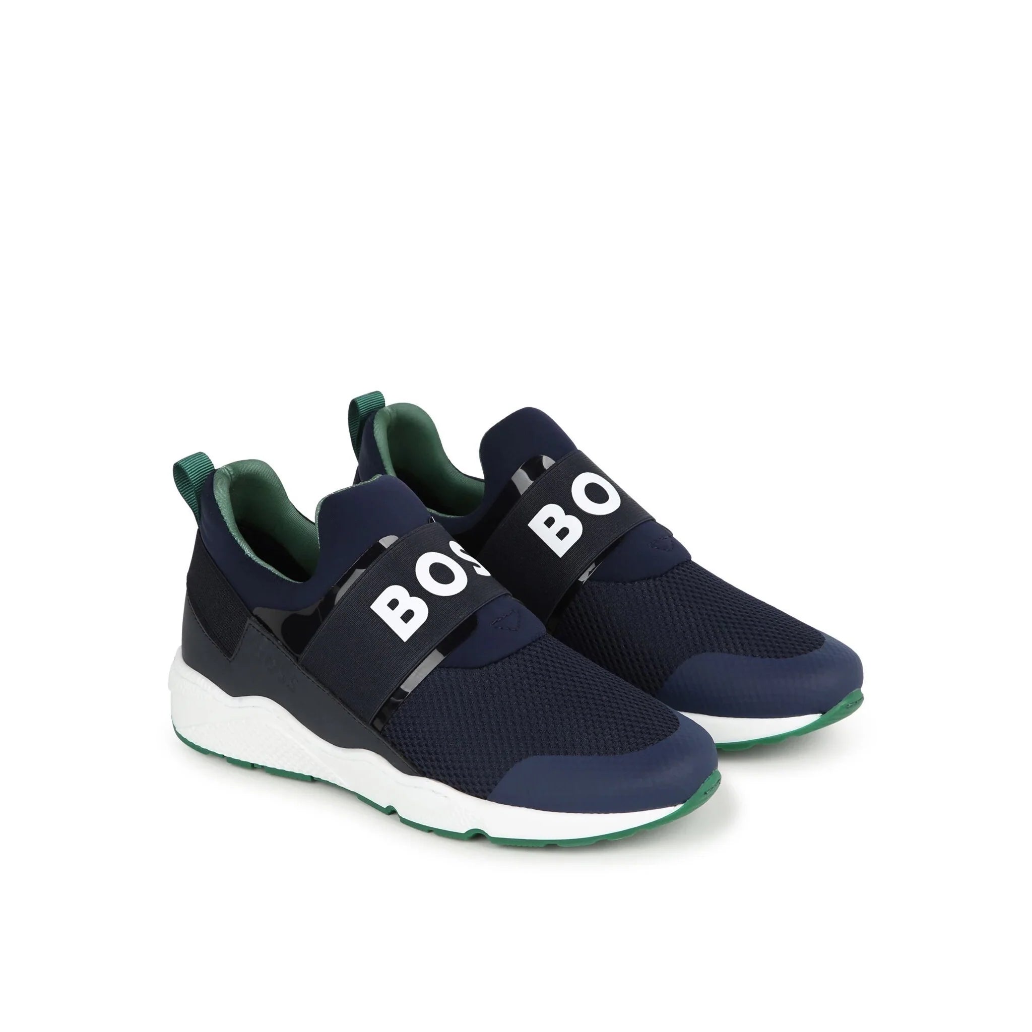 BOSS KIDS navy slip-on sneakers featuring a stylish logo print across the front and a convenient pull-tab at the heel for easy wear. Crafted from a premium mesh and leather outer with a soft fabric lining, these sneakers are designed for comfort and durability. The rubber sole provides excellent traction, making them perfect for active days. Ideal for young boys who appreciate both style and functionality, available at Lestyle Boutique Melbourne.