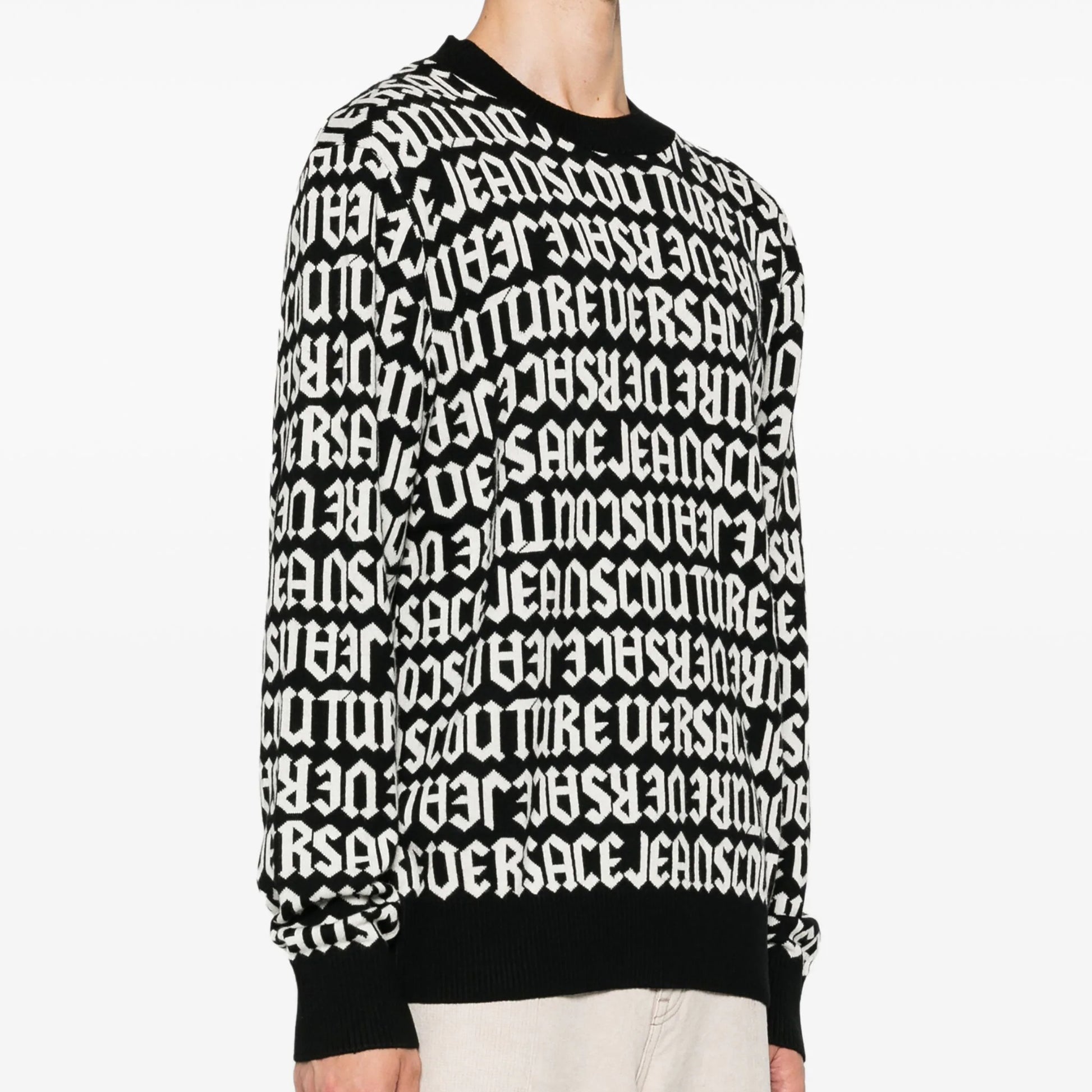 Versace Jeans Couture black Logomania sweater with an all-over logo pattern, available at Lestyle Boutique Melbourne. A bold and stylish choice for casual wear.