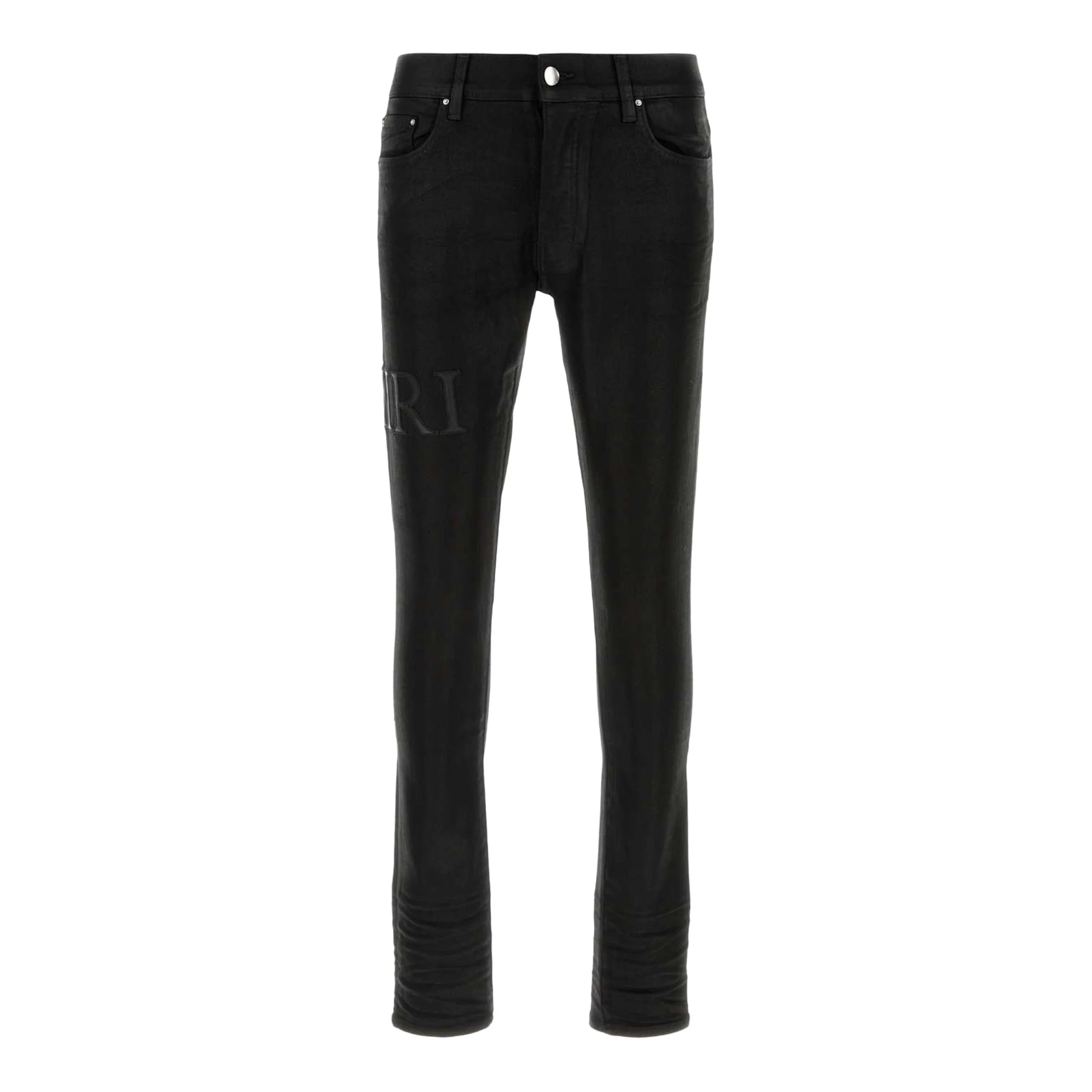 A pair of black stretch skinny jeans by AMIRI, available at Lestyle Boutique. These jeans feature a comfortable fit with a sleek design, button and zip closure, and classic five-pocket detailing.