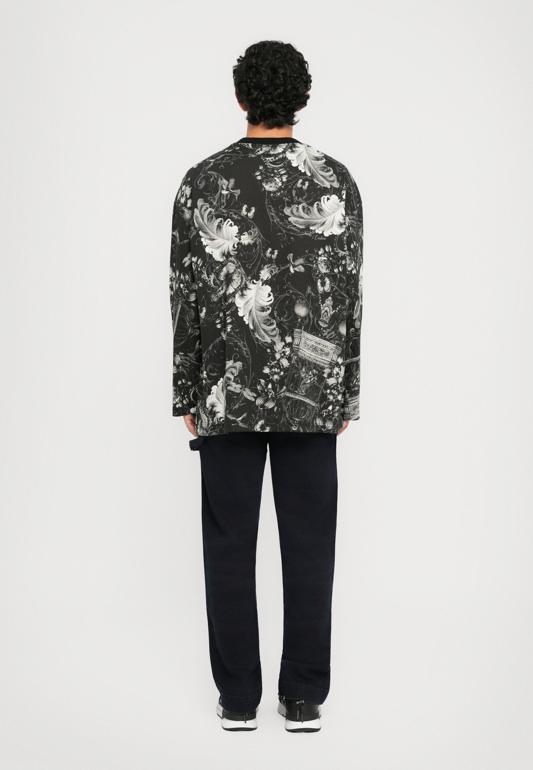 VERSACE JEANS COUTURE LONG SLEEVE TOP featuring monochrome floral print in black/white available at Lestyle Boutique Melbourne
