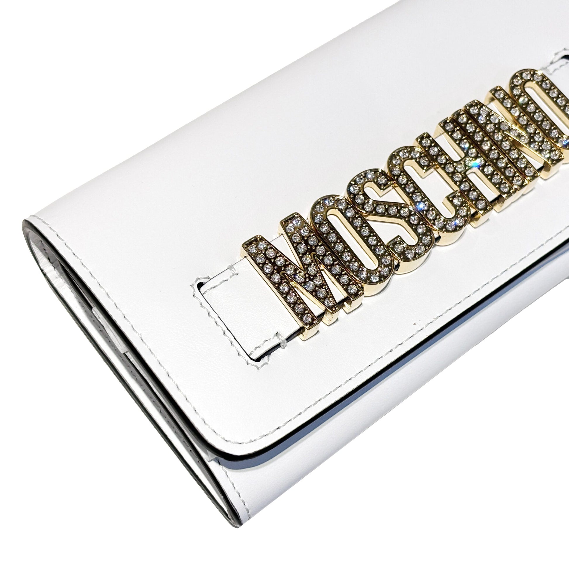 Moschino white clutch bag with gold-plated rhinestone logo, available at Lestyle Boutique Melbourne. A glamorous choice for evening events.