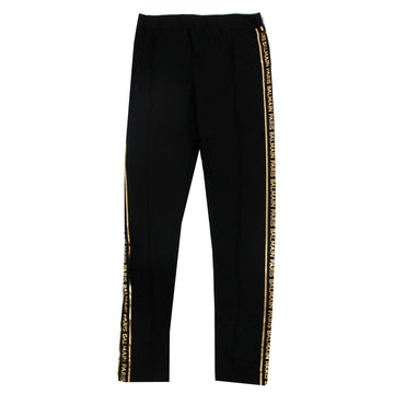 Luxury Balmain kids black track pants featuring a stylish logo tape design along the sides. These premium pants are crafted from high-quality materials, ensuring comfort and durability for active children. The modern fit and sleek design make them perfect for casual outings or playdates, providing both style and functionality. Ideal for young fashion enthusiasts, available at Lestyle Boutique Melbourne.