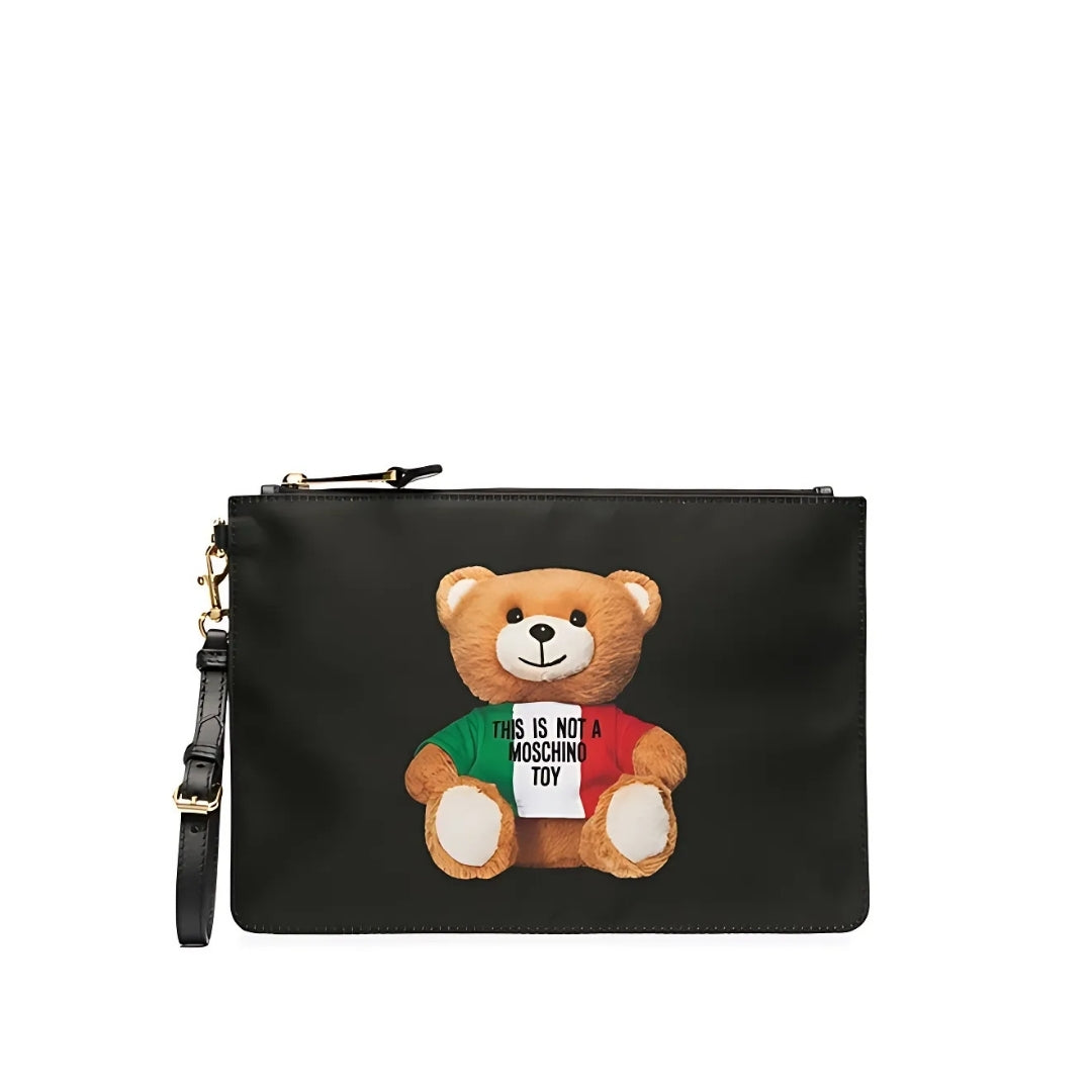 Moschino black nylon clutch featuring a multicolor Teddy Bear print, top zip closure, and wrist strap, available at Lestyle Boutique 136 Little Collins St.