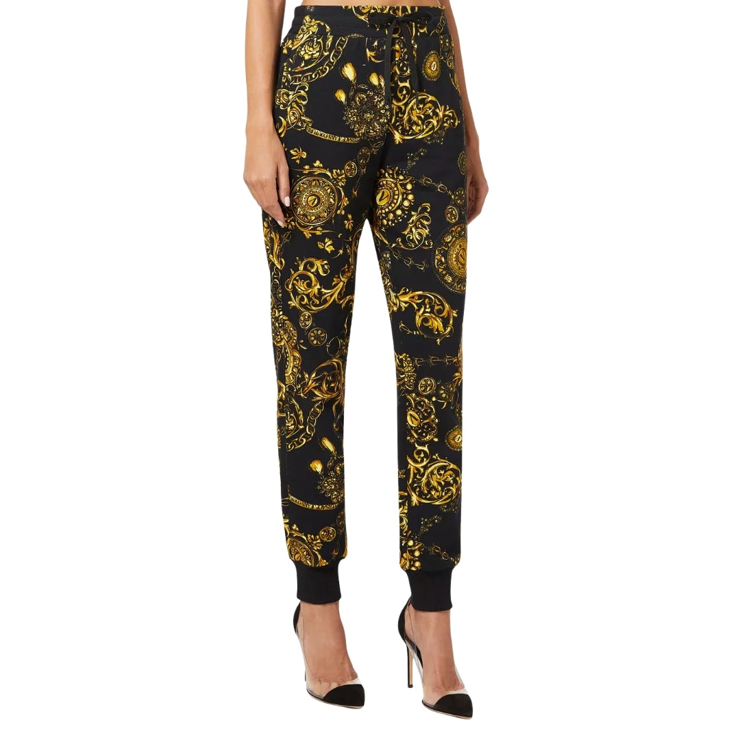 Versace Jeans Couture black and multi Baroque print lounge pants in a polyester-cotton blend featuring a drawstring waist and ribbed cuffs, available at Lestyle Boutique 136 Little Collins St.