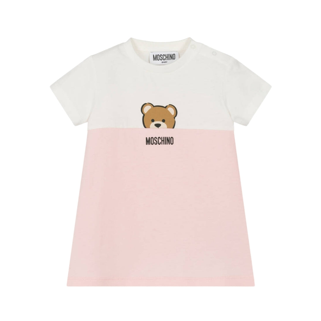 Moschino Kids girls' organic cotton jersey t-shirt dress featuring a white upper and pink lower section, crew neck, short sleeves, and a Moschino Teddy Bear print on the chest, made in Europe, available at Lestyle Boutique 136 Little Collins St.
