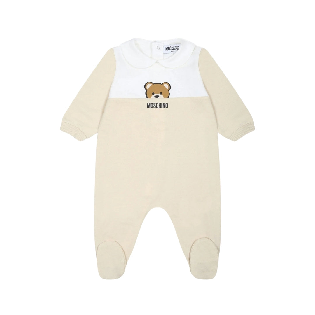 Moschino Baby footed romper featuring a color-block design with white/cream chest panel and beige quilted body/sleeves/feet, Peter Pan collar, long sleeves, and Teddy Bear print, available at Lestyle Boutique 136 Little Collins St.