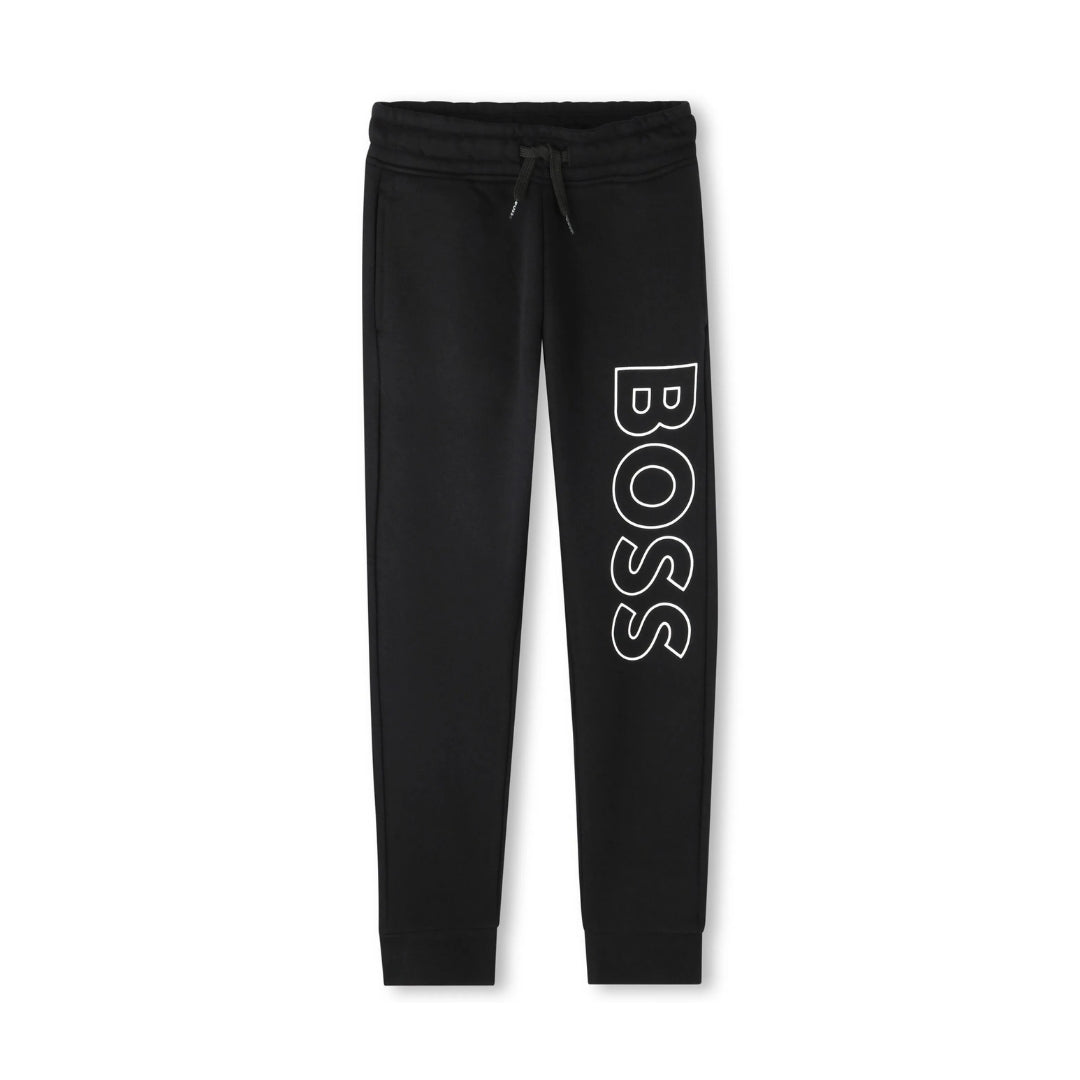 BOSS Kidswear black cotton blend jersey track pants for boys, featuring a large white embroidered logo on the leg, elasticated drawstring waistband, two side inset pockets, and ribbed ankles, available at Lestyle Boutique 136 Little Collins St.