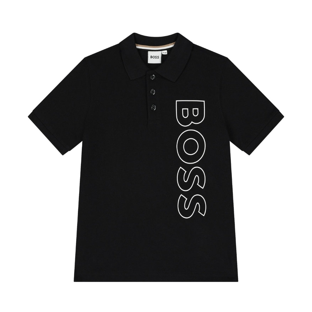 BOSS boys black polo shirt featuring a large white outline vertical logo print on the front, polo collar, and short sleeves, available at Lestyle Boutique 136 Little Collins St.