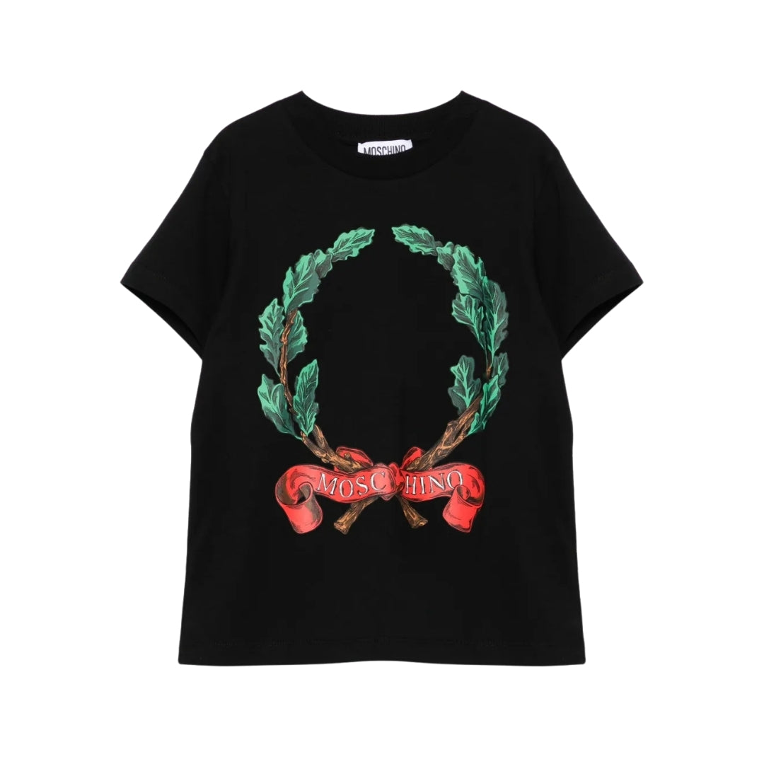 Moschino Kids black t-shirt with crew neck and short sleeves, featuring a green laurel wreath print with a red ribbon banner and white Moschino logo on the chest, available at Lestyle Boutique 136 Little Collins St.