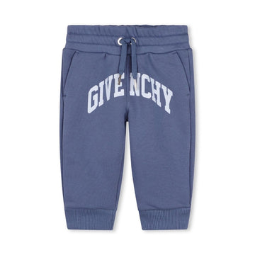 Givenchy Baby Boys blue cotton joggers with a large varsity-style front logo, elasticated drawstring waistband, and a fleecy feel inside, available at Lestyle Boutique 136 Little Collins St.