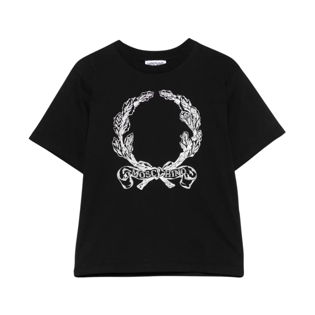 Moschino Kids black t-shirt with crew neck and short sleeves, featuring a white laurel wreath print with a ribbon banner and Moschino logo on the chest, available at Lestyle Boutique 136 Little Collins St.