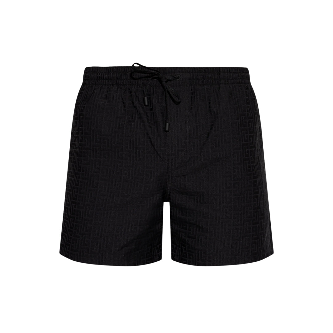 Balmain black swim shorts featuring a unique combination of classic cut and modern materials, ensuring comfort and elegance. Available at Lestyle Boutique Melbourne.