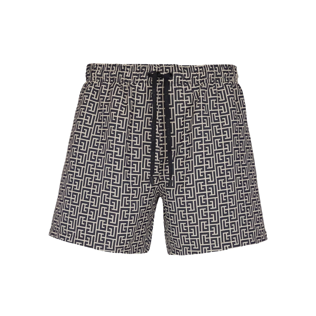 Balmain premium black swim shorts featuring a distinctive labyrinth print. These luxury designer swim shorts are designed with an elasticated waist for a comfortable fit and adjustable drawstring for added convenience. The stylish design includes side pockets and is perfect for beach outings or poolside lounging. Crafted with high-quality materials, these shorts ensure durability and a fashionable look. Ideal for the modern man seeking both style and comfort, available at Lestyle Boutique Melbourne.