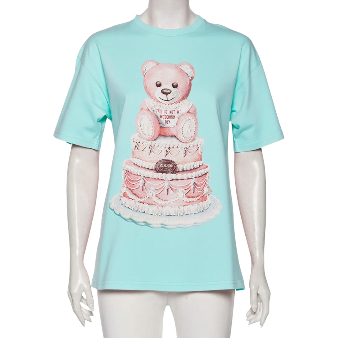 Moschino T-shirt featuring a bear on a cake. Available at Lestyle Boutique Melbourne
