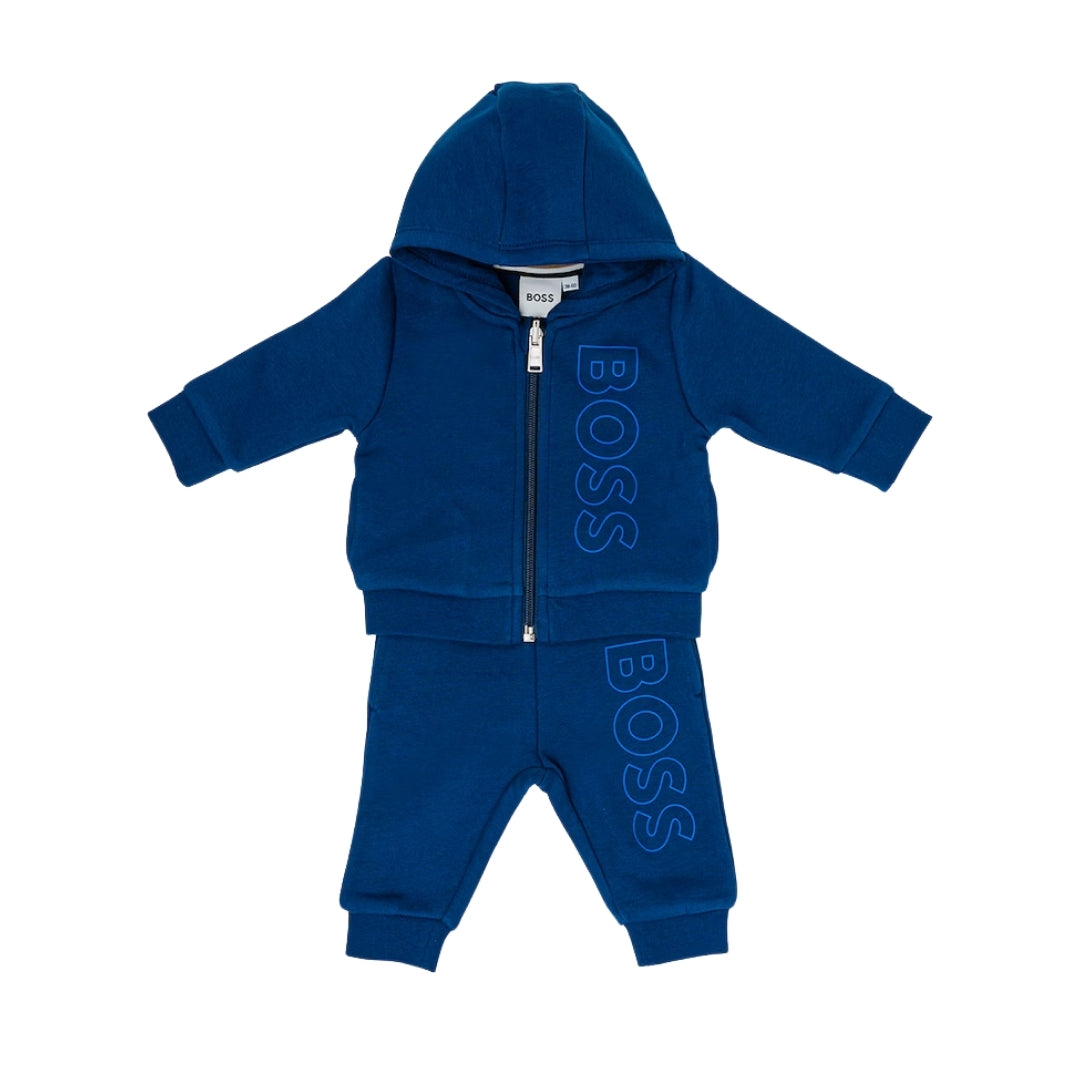 BOSS Kidswear dark blue cotton blend tracksuit, including a zip-up hoodie with a vertical logo and pouch pockets, and sports pants with a logo, available at Lestyle Boutique 136 Little Collins St.