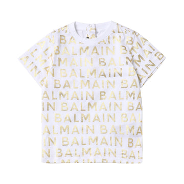 Balmain Kids t-shirt featuring a stylish logo lettering design in a premium cotton fabric. This luxury piece showcases a classic crew neck and short sleeves, perfect for casual outings. The straight hem adds a modern touch, making it ideal for young fashion enthusiasts. Crafted with high-quality materials, this designer t-shirt is perfect for elevating your child's wardrobe. Available at Lestyle Boutique Melbourne.
