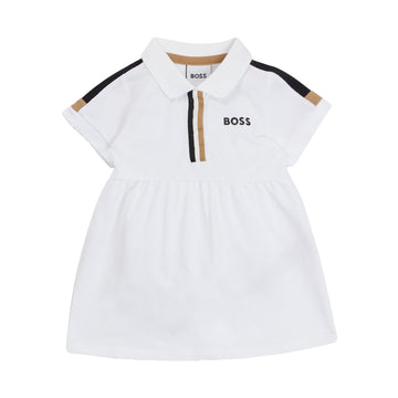 Elegant BOSS kids dress in white stretch-cotton piqué featuring a stylish collar with contrast stripe accents. This premium piece is designed for comfort and style, showcasing a regular fit that flatters young wearers. The buttoned placket adds a touch of sophistication, making it perfect for casual outings or special occasions. Crafted with high-quality materials, this dress ensures durability and ease of care, ideal for active children. Available at Lestyle Boutique Melbourne.