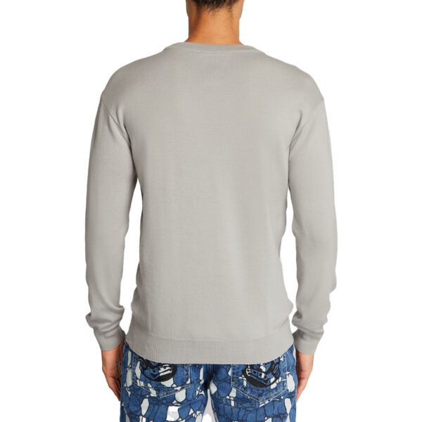 Moschino jumper featuring a teddy bear patch, available at Lestyle Boutique Melbourne