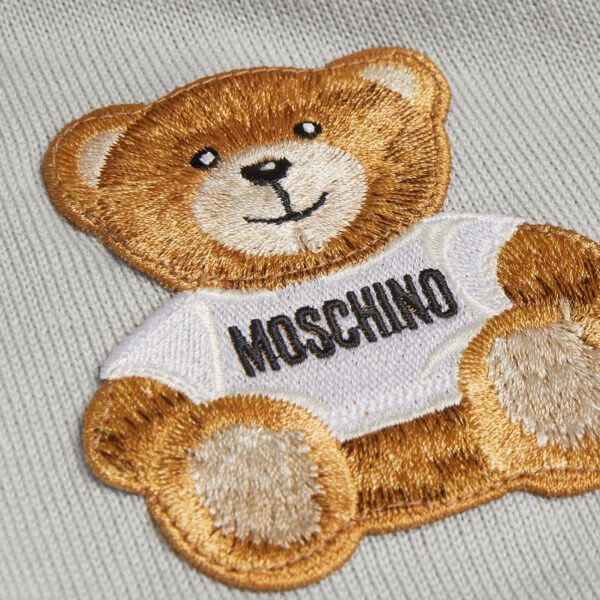 Moschino jumper featuring a teddy bear patch, available at Lestyle Boutique Melbourne