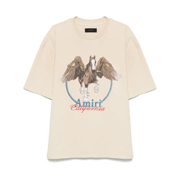 An alabaster vintage wash t-shirt by AMIRI, available at Lestyle Boutique. Featuring a bold Pegasus print and Amiri California logo, this tee offers a unique retro-inspired style.