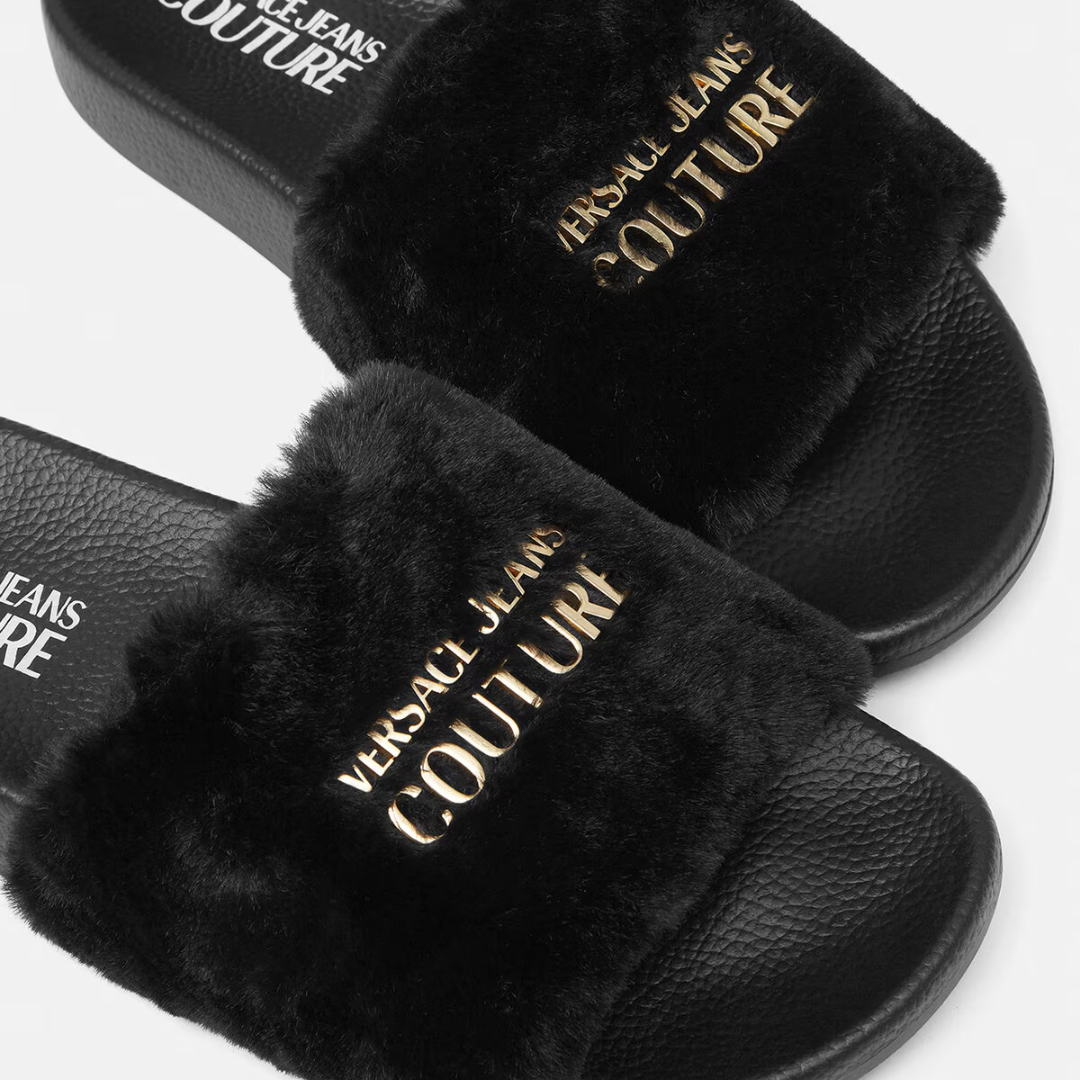VERSACE JEANS COUTURE SLIDES with faux-fur uppers and a logo on black rubber sole, available at Lestyle Boutique Melbourne
