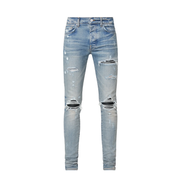 AMIRI JEANS featuring distressed, ripped knee details and vintage-wash finish available at Lestyle Boutique Melbourne