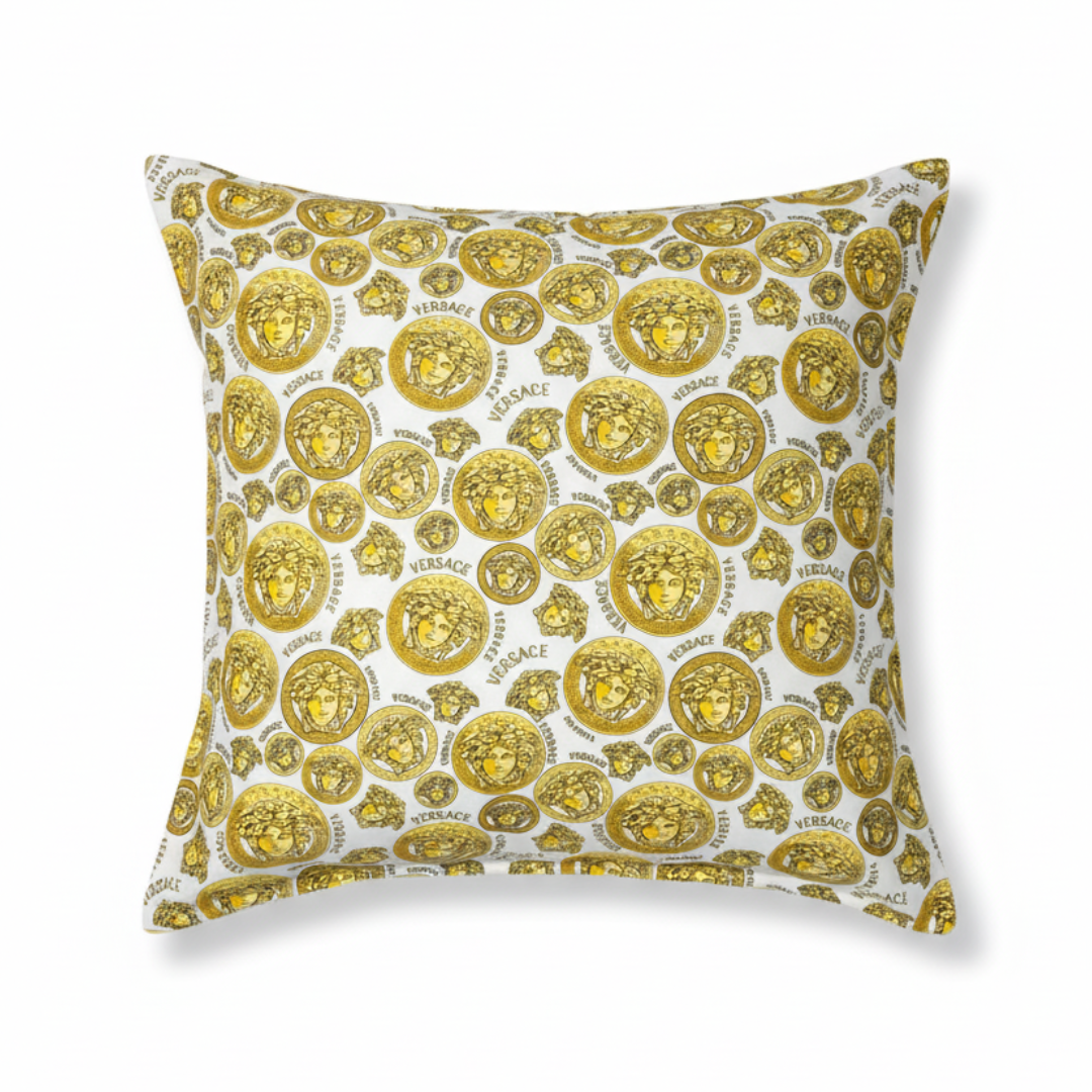 VERSACE Cushion featuring gold medallion motif available at Lestyle Boutique Melbourne