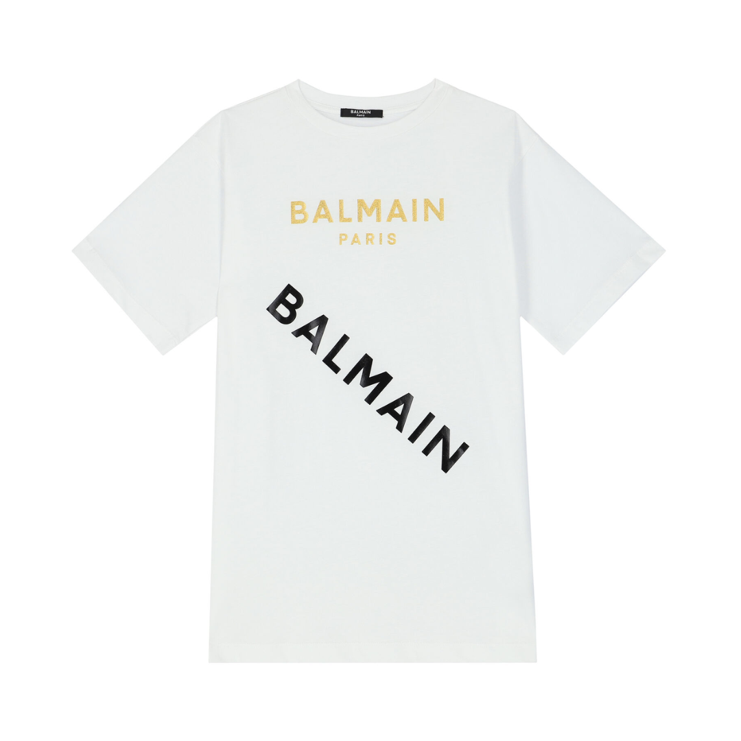 BALMAIN T-SHIRT featuring gold foil logo and diagonal black BALMAIN print available at Lestyle Boutique Melbourne
