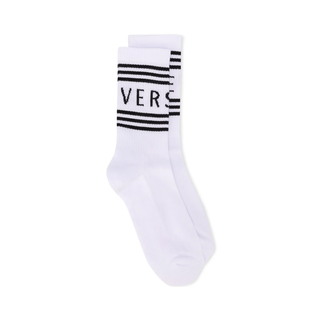 Versace logo-print ankle socks featuring ribbed knit, white with black logo, available at Lestyle Boutique Melbourne
