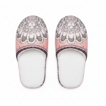 Pair of slippers with decorative design on a white background