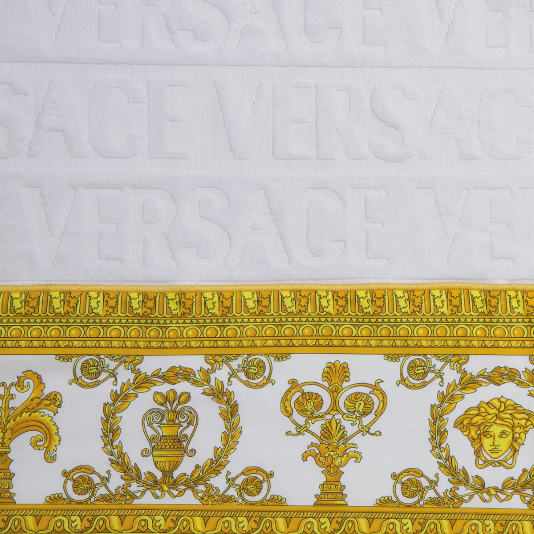 Versace towel with white and gold baroque motif and logo band available at Lestyle Boutique Melbourne
