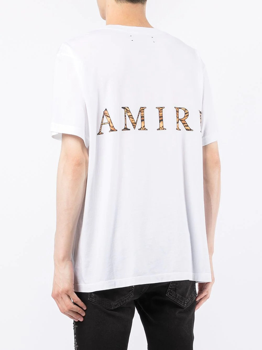 Amiri white cotton t-shirt featuring a striking Chinese New Year logo print on the front. This premium designer piece showcases a relaxed fit with a straight hem for effortless style. The high-quality cotton fabric ensures comfort and durability, making it perfect for casual outings or festive occasions. Ideal for fashion-forward individuals looking to elevate their wardrobe with a unique statement piece, available at Lestyle Boutique Melbourne.