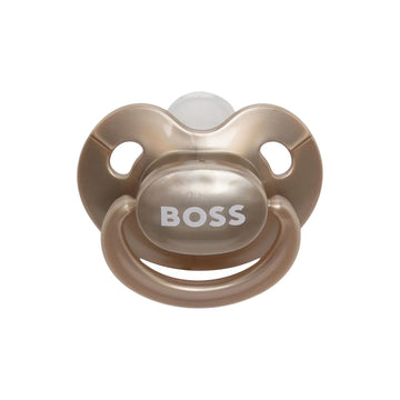 Luxurious BOSS Kidswear gold logo-print dummy featuring a stylish metallic finish and an easy-grip handle. This premium accessory is designed for comfort and everyday use, making it perfect for fashionable infants. The high-quality materials ensure durability and safety, while the iconic BOSS branding adds a touch of elegance. Ideal for parents seeking a blend of style and functionality for their little ones, available at Lestyle Boutique Melbourne.