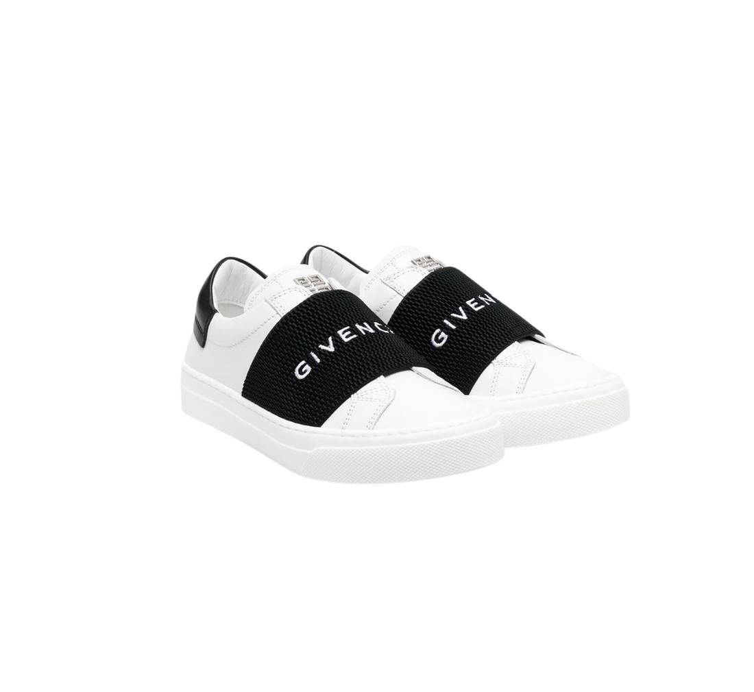 White and black Givenchy Kids logo-strap leather sneakers featuring a slip-on style and rubber sole, available at Lestyle Boutique Melbourne.