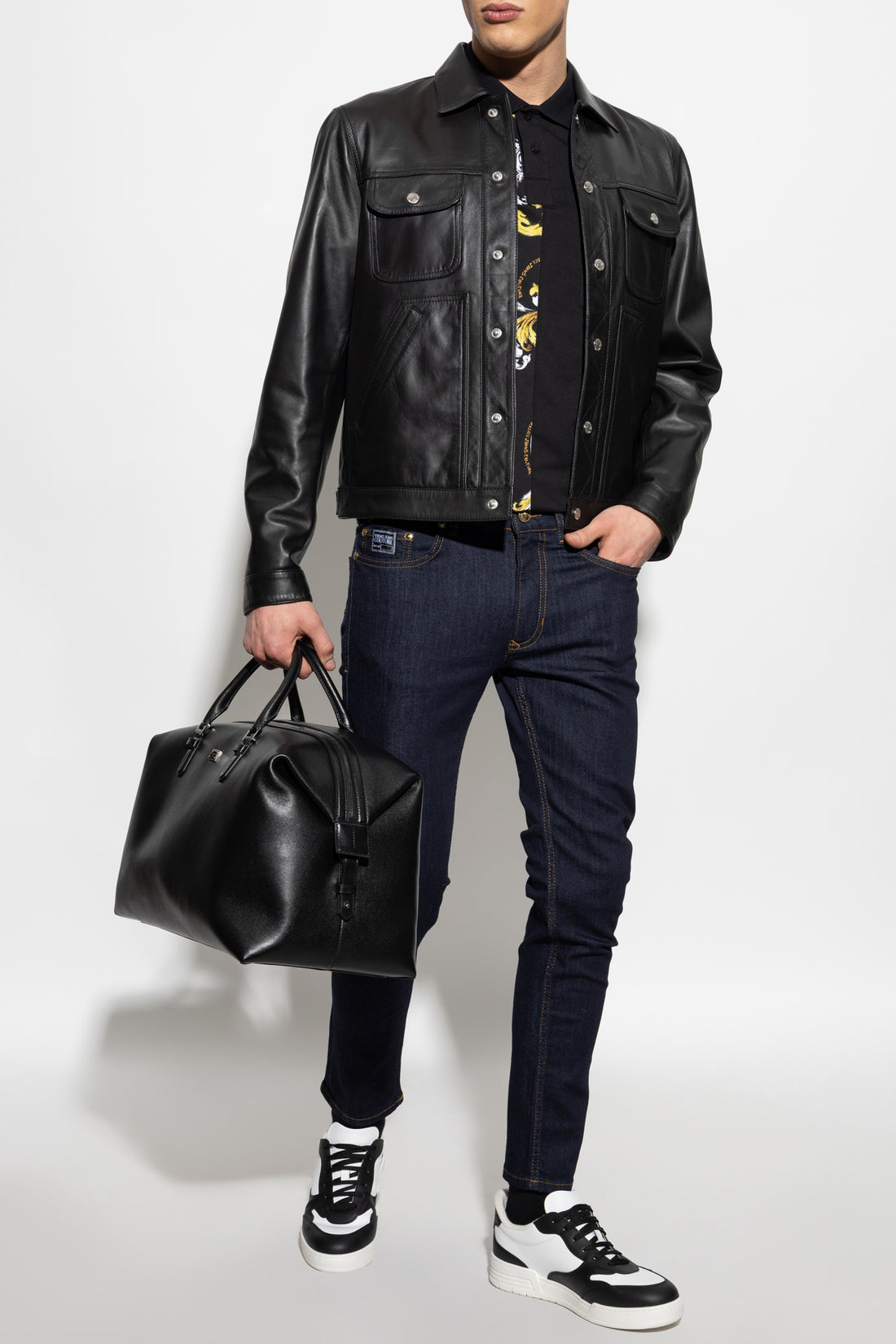 Versace Jeans Couture Navy Blue Skinny Jeans featuring contrast stitching, a signature logo patch, and a slim-fit silhouette. Crafted from premium stretch denim for all-day comfort, available at Lestyle Boutique.