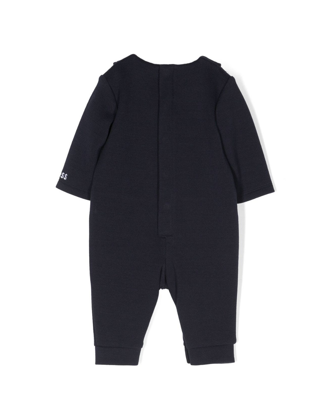 BOSS Kidswear tailored all-in-one suit in classic black, designed for comfort and style. This premium piece features long sleeves, a straight leg, and decorative button detailing, making it perfect for special occasions. The elasticated ankles ensure a snug fit, while the rear press-stud fastening adds convenience. Ideal for your little one’s formal events, this luxury designer outfit combines quality craftsmanship with chic design, available at Lestyle Boutique Melbourne.