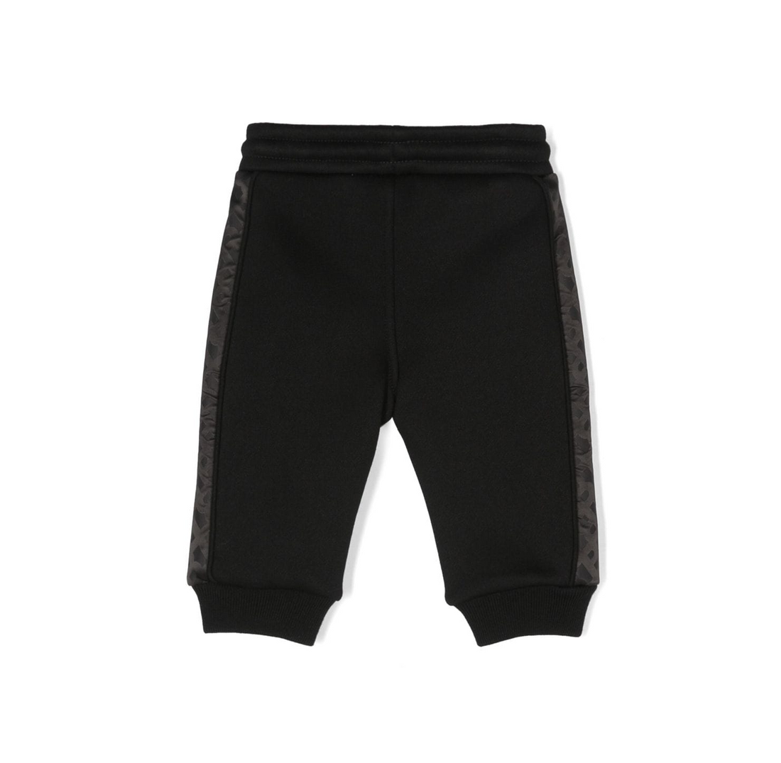 BOSS kidswear black stretch-cotton pants featuring a stylish monogram pattern and side stripe detailing. These premium designer pants offer a comfortable fit with an elasticated drawstring waistband and elasticated ankles, perfect for active toddlers. Ideal for casual outings or playdates, these pants combine luxury and functionality, available at Lestyle Boutique Melbourne.