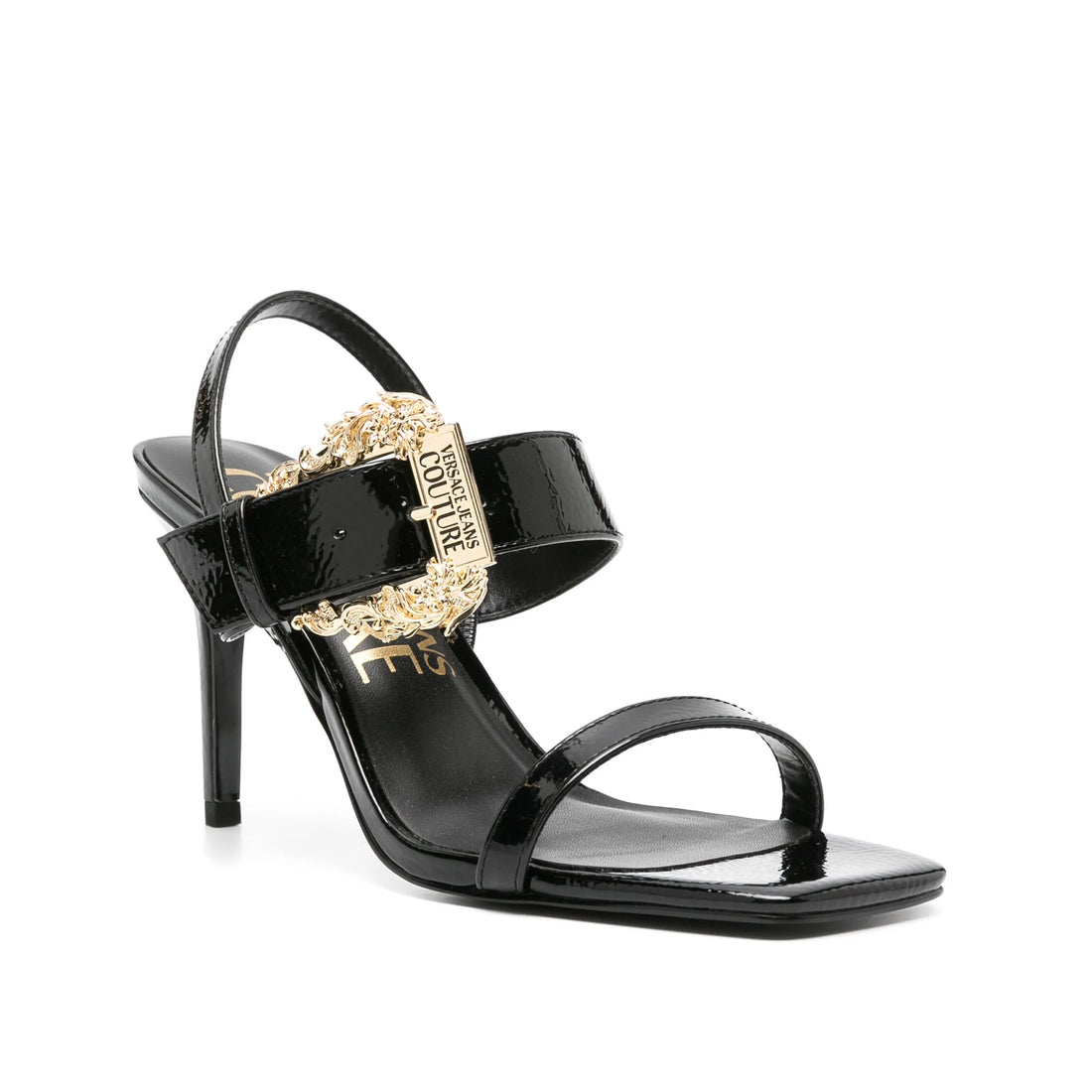 Versace Jeans Couture Emily 95mm Slingback Sandals in black, featuring a Baroque buckle detail and glossy patent finish. Elegant and perfect for evening looks, available at Lestyle Boutique.