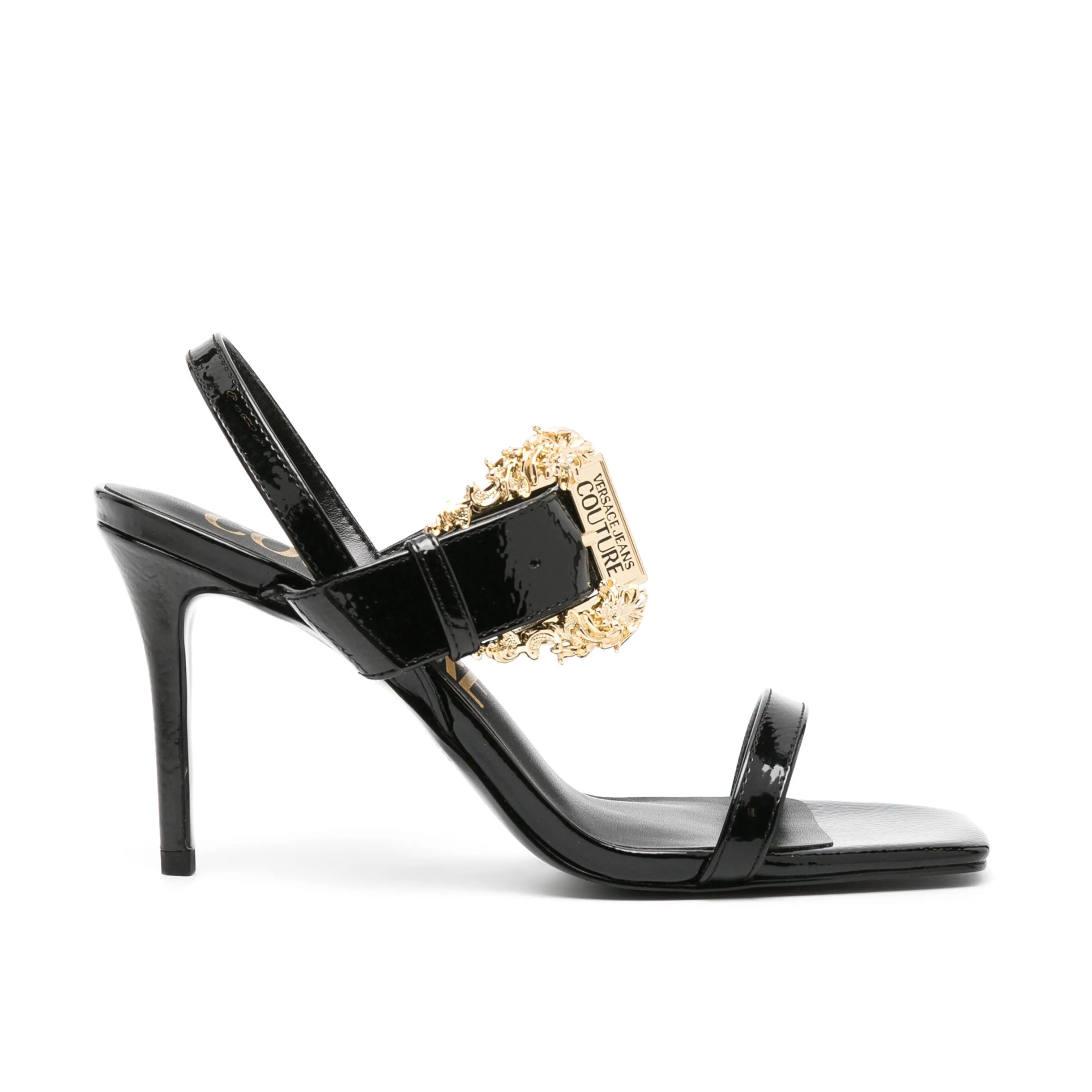 Versace Jeans Couture Emily 95mm Slingback Sandals in black, featuring a Baroque buckle detail and glossy patent finish. Elegant and perfect for evening looks, available at Lestyle Boutique.