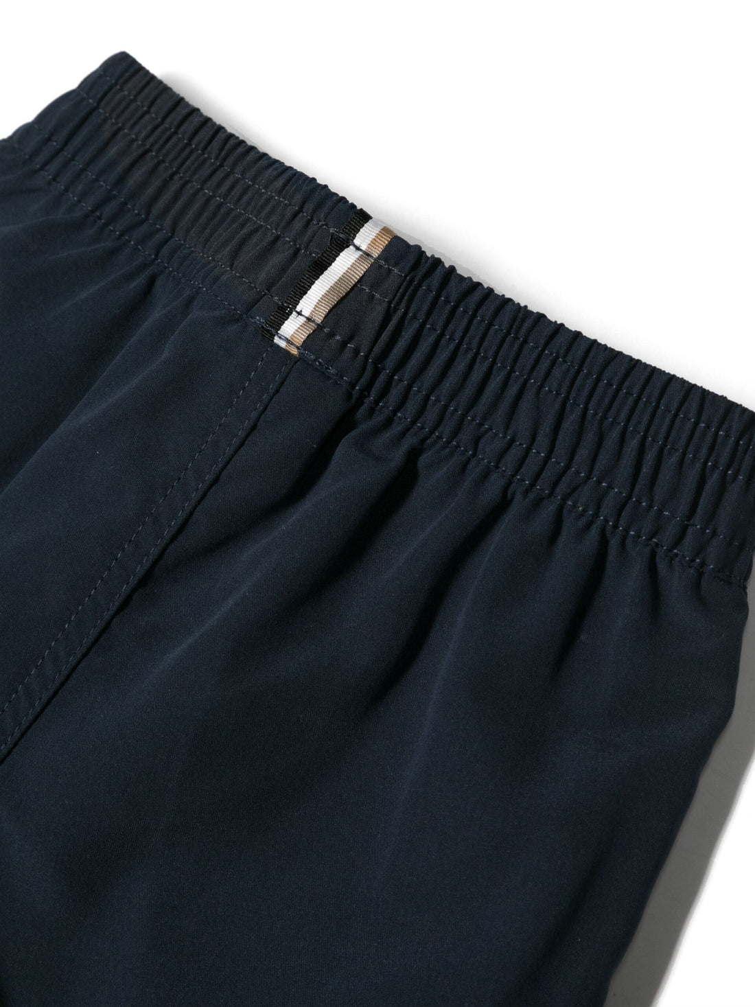 BOSS Kidswear navy swim shorts with a logo print, available at Lestyle Boutique.