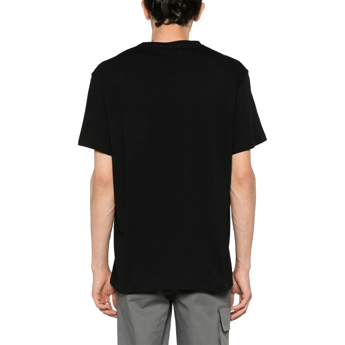 Luxury Alexander McQueen black cotton t-shirt featuring a striking logo print on the back. This designer piece showcases a classic crew neck design with a relaxed fit, perfect for casual wear. The high-quality cotton fabric ensures comfort and durability, making it an ideal choice for fashion-forward individuals. Perfect for elevating your everyday wardrobe with a touch of sophistication, available at Lestyle Boutique Melbourne.