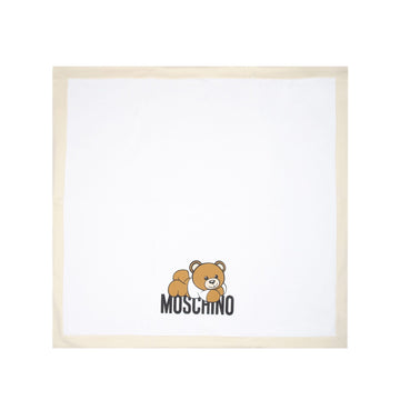 Moschino Kids cotton blanket in white with a beige border featuring a teddy bear print, available at Lestyle Boutique Melbourne.