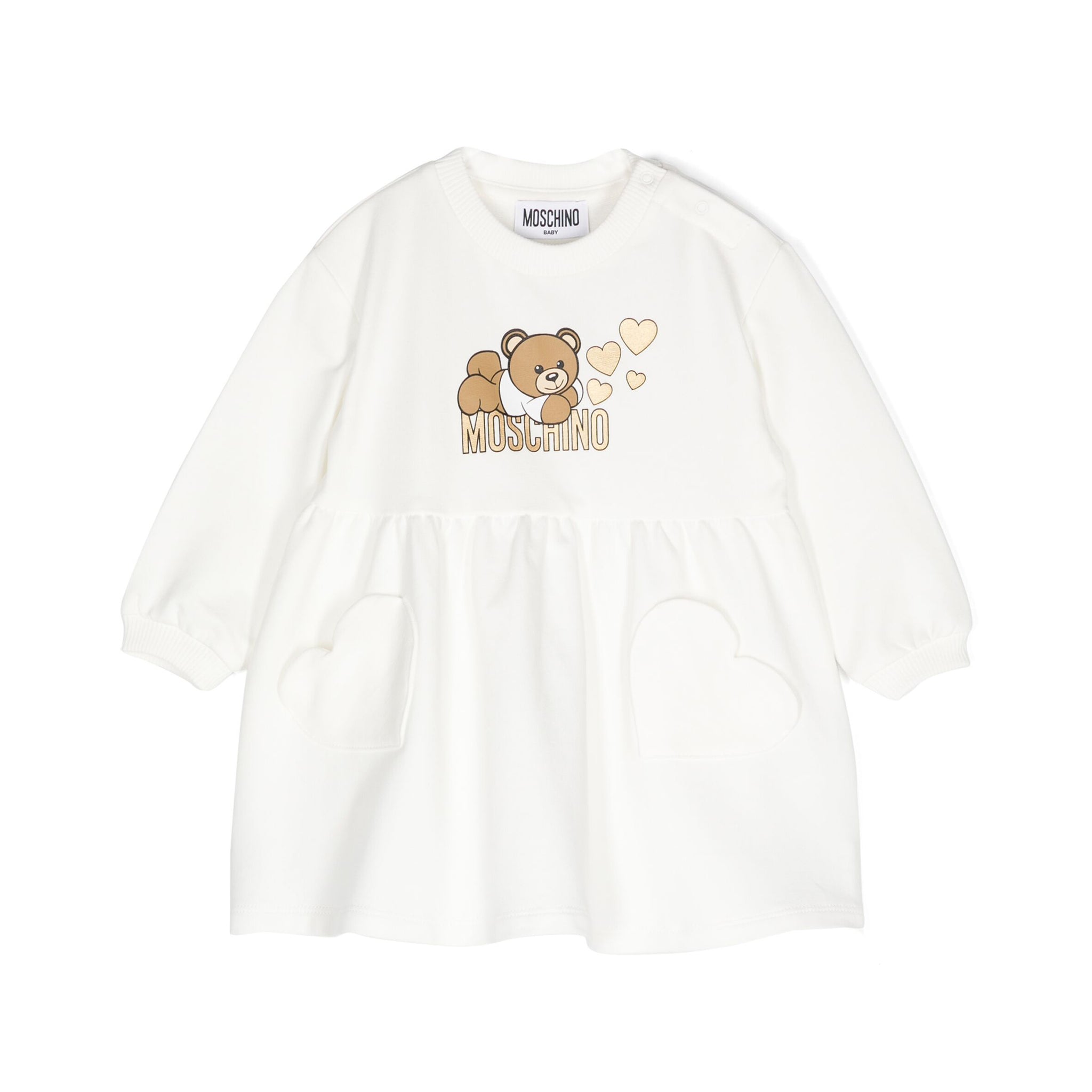 Moschino Kids ivory A-line dress featuring a teddy bear print with gold hearts and heart-shaped pockets, available at Lestyle Boutique Melbourne.