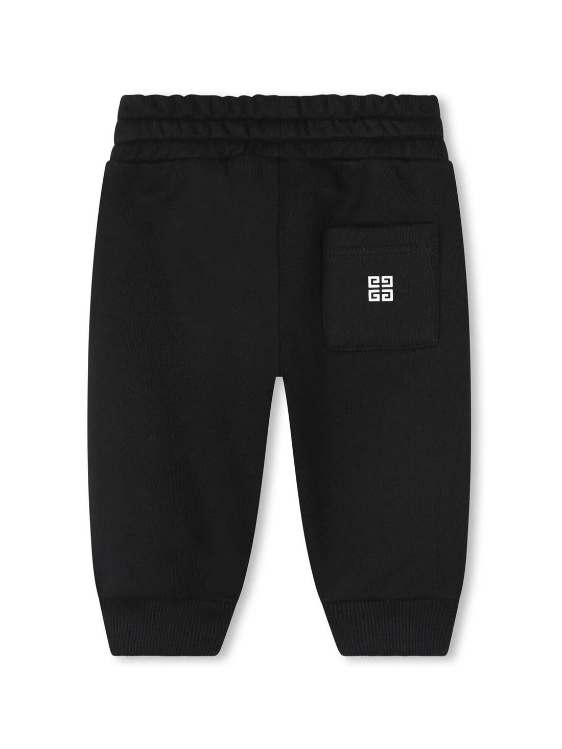 Givenchy Kids black and white cotton blend track pants with 4G-motif, front logo print, and elasticated drawstring waistband, available at Lestyle Boutique 136 Little Collins St.